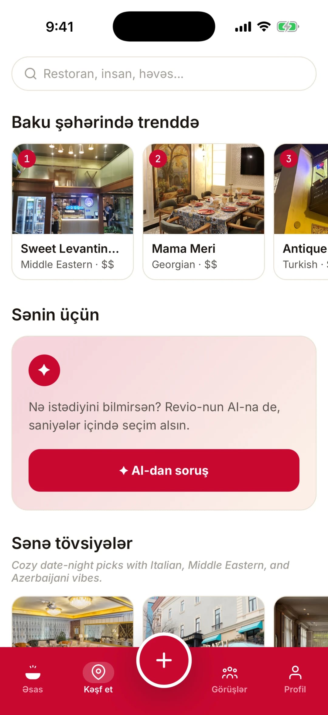 Revio Kəşf et ekranı: trenddə olan restoranlar, “AI-dan soruş” kartı və şəxsi tövsiyələr.